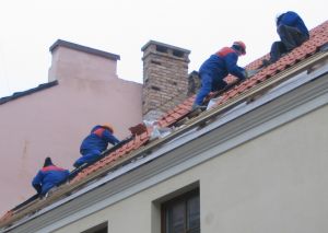 men on a roof