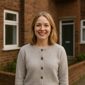 woman standing in front of flat